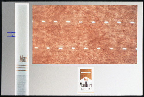 Photograph of filter tipping paper showing filter vents